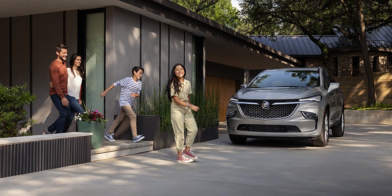 children excited to get into their brand new 2024 Buick Enclave