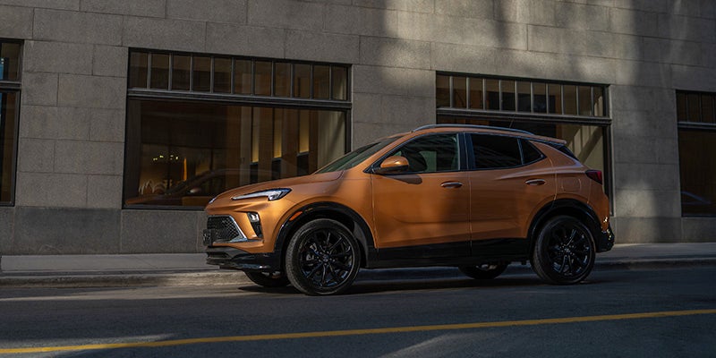 New 2024 Buick Encore GX driving down the street