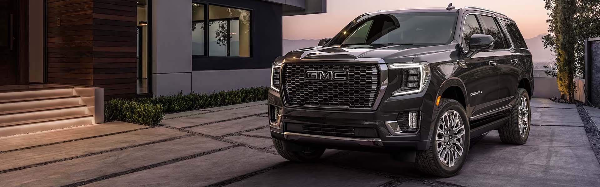 2023 GMC Yukon in the driveway of someone's home