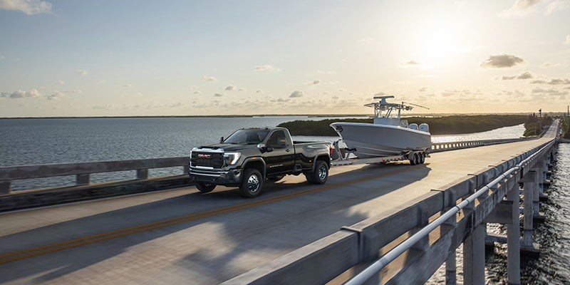 GMC Sierra on the road hitching a boat